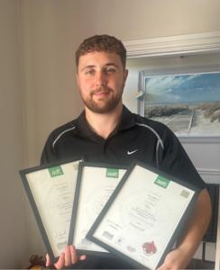 Star Student September 2026 Harry Milford holding his AAT certificates after completing his AAT Level 4 Accountancy Apprenticeship with Accountancy Learning.