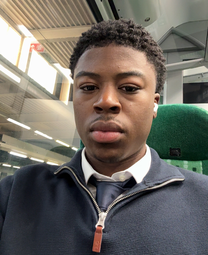 Jordan Njipap, Accountancy Learning Star Student for August 2026, pictured travelling on a train.
